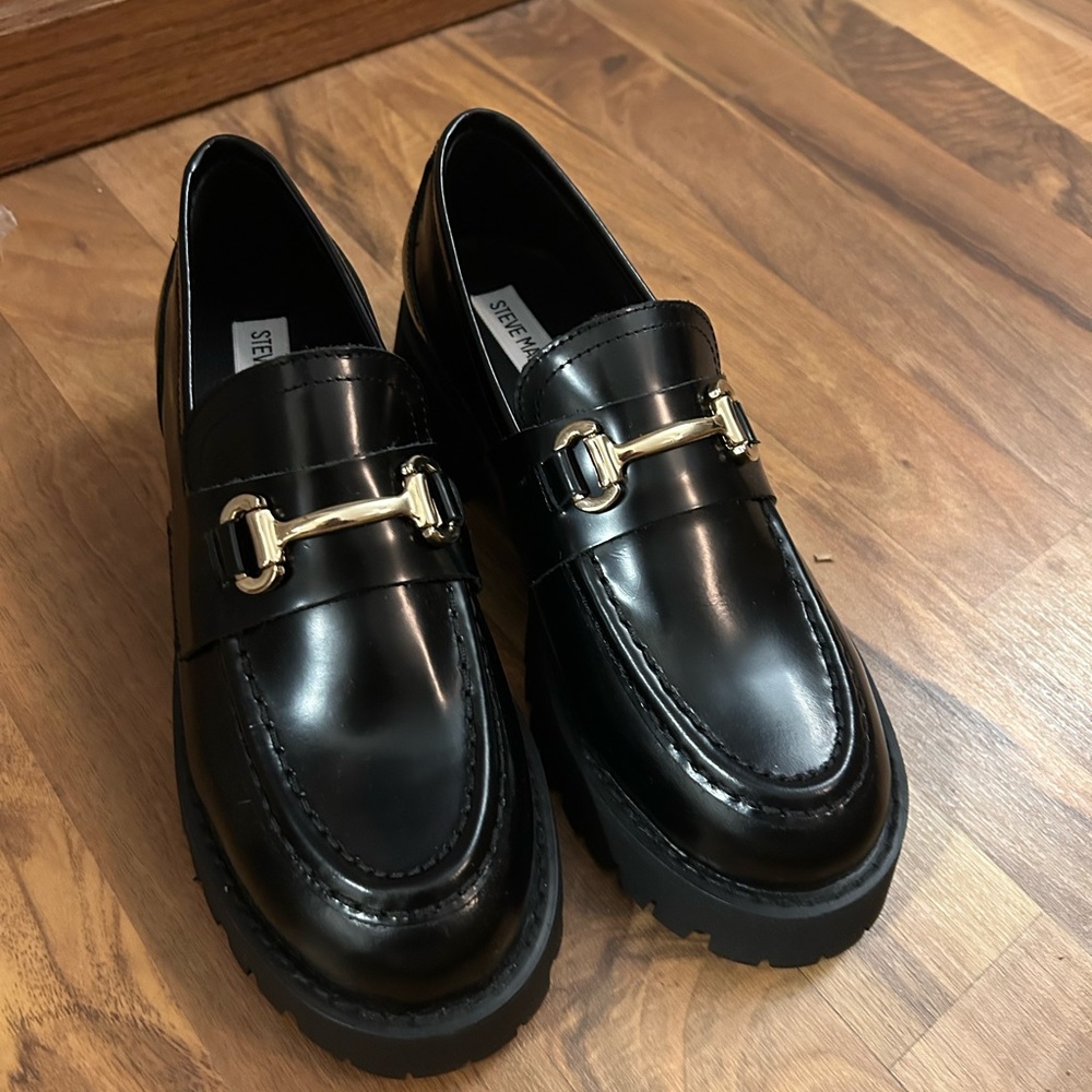 Steve Madden Glossy Black Loafers with Gold Accent